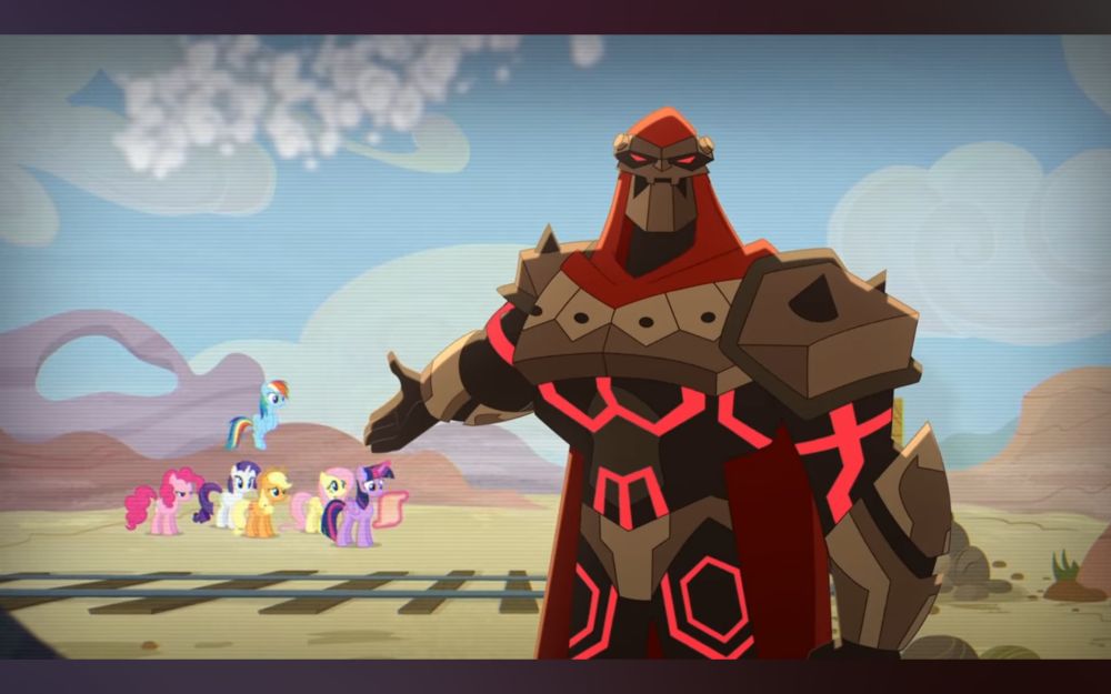 Screenshot of Micronauts S1E14 "The Merger" showing Baron Karza in front of a television playing My Little Pony: Friendship is Magic S5E01 "The Cutie Map- Part 1"