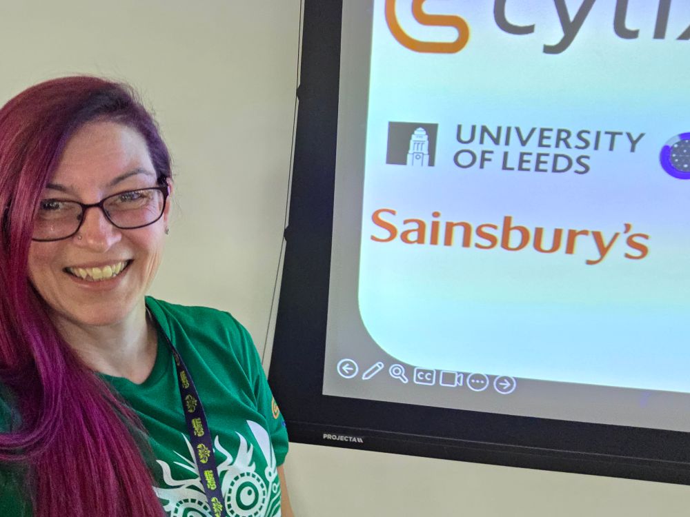 Me in front of the sponsors slide showing Sainsburys