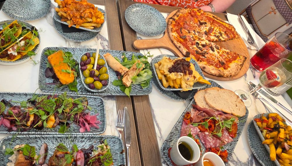Many plates of delicious food.