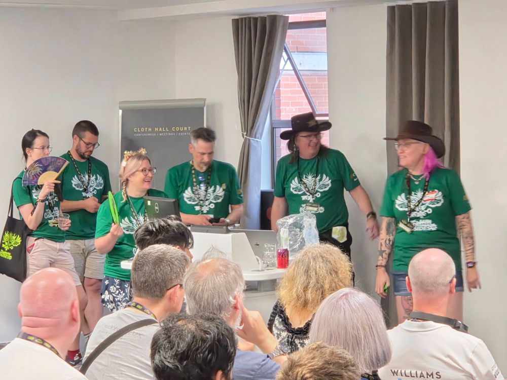 Most of the tired and emotional organisers doing the closing remarks at the end of the day.