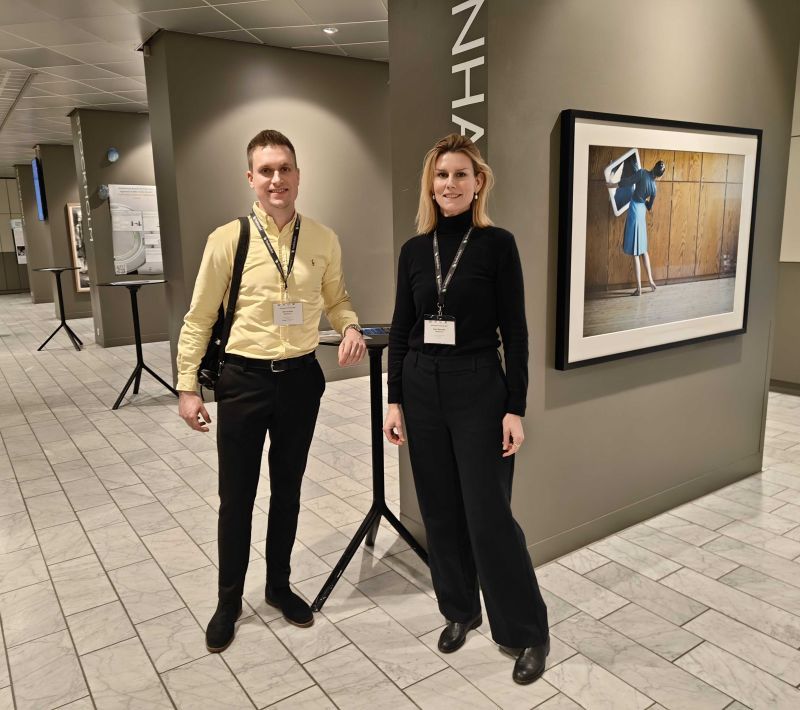 Martin Bjerregaard and Rikke Bachmann of Radiobotics standing together for a photo at Billeddiagnostisk Årsmøde in Copenhagen.