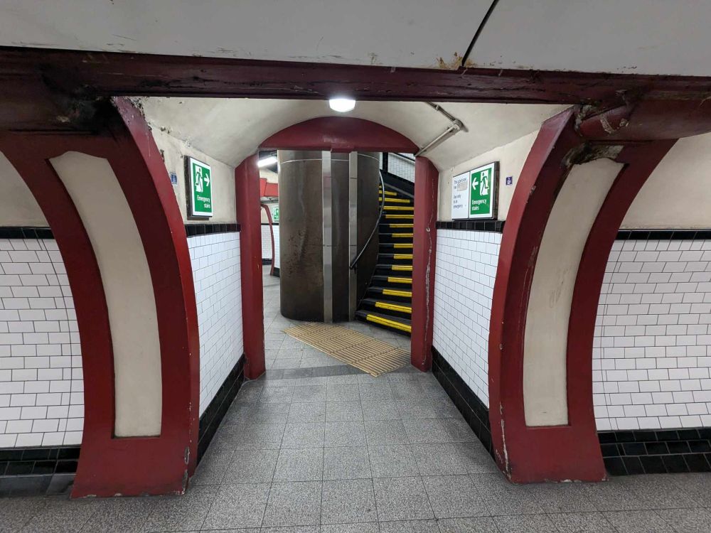A spiral staircase inside a London Underground station (Elephant & Castle I think?)