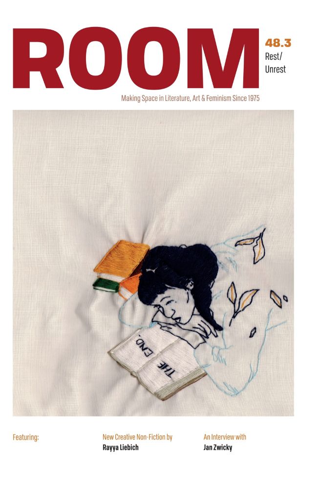 Embroidery illustration of a girl wearing a shirt with leaves printed on it, and her hair tied to the side. She is lying on her stomach with a stack of yellow, orange, and green books by her side as she stares at an opened book that reads "The End". 