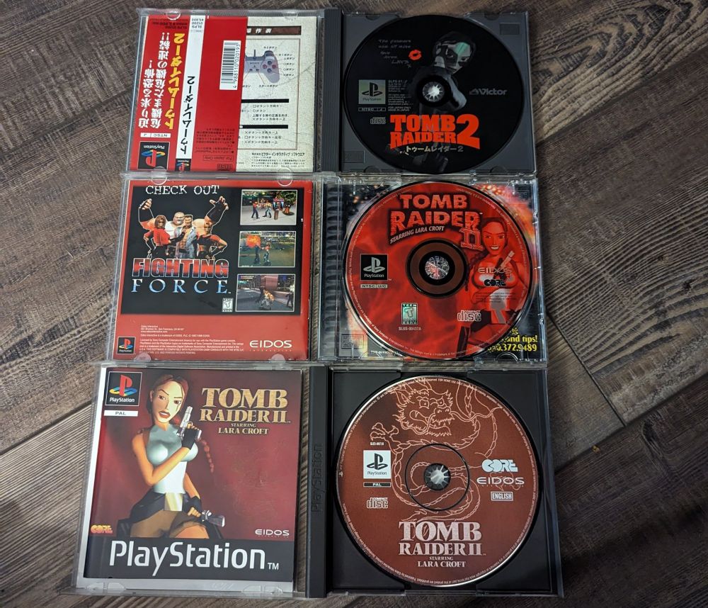 Three Tomb Raider II disks (all from different regions).