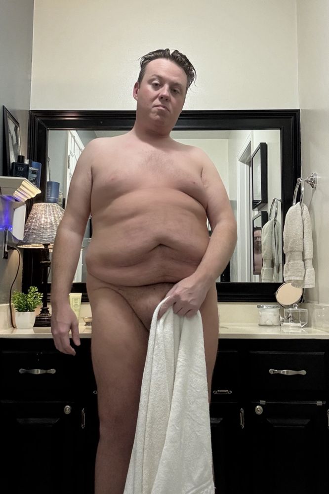 Tyler is posing nude in the bathroom, post shower, with only a towel to preserve his dignity 
