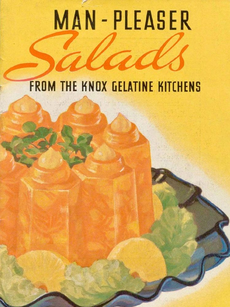A vintage illustration of an elaborate orange molded jello creation with green garnish and pineapple slices with the title MAN-PLEASER SALADS
