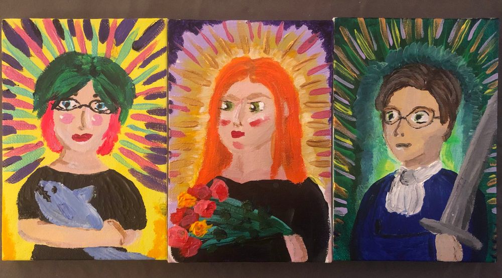 Three paintings by Amanda. First of a woman with green and pink hair holding a shark, second of a woman with orange hair holding flowers, and third of a non-binary person with brown hair holding a sword!
