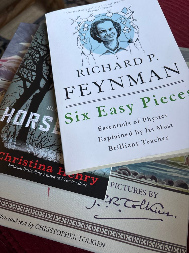 The newest books to my collection. Six Easy Pieces, Feynman; Horseman, Henry; Pictures by JRR Tolkien, Tolkien. 
