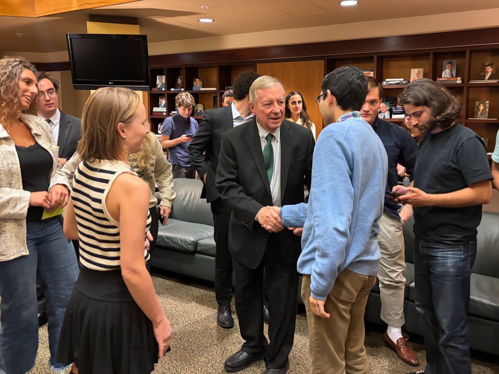 Senator Dick Durbin shakes a student's hand