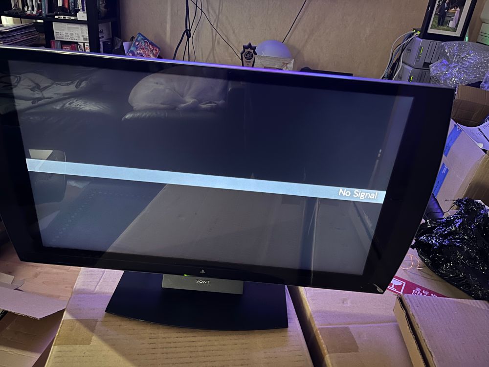 A black TV, it shows a Bar that says No Signal