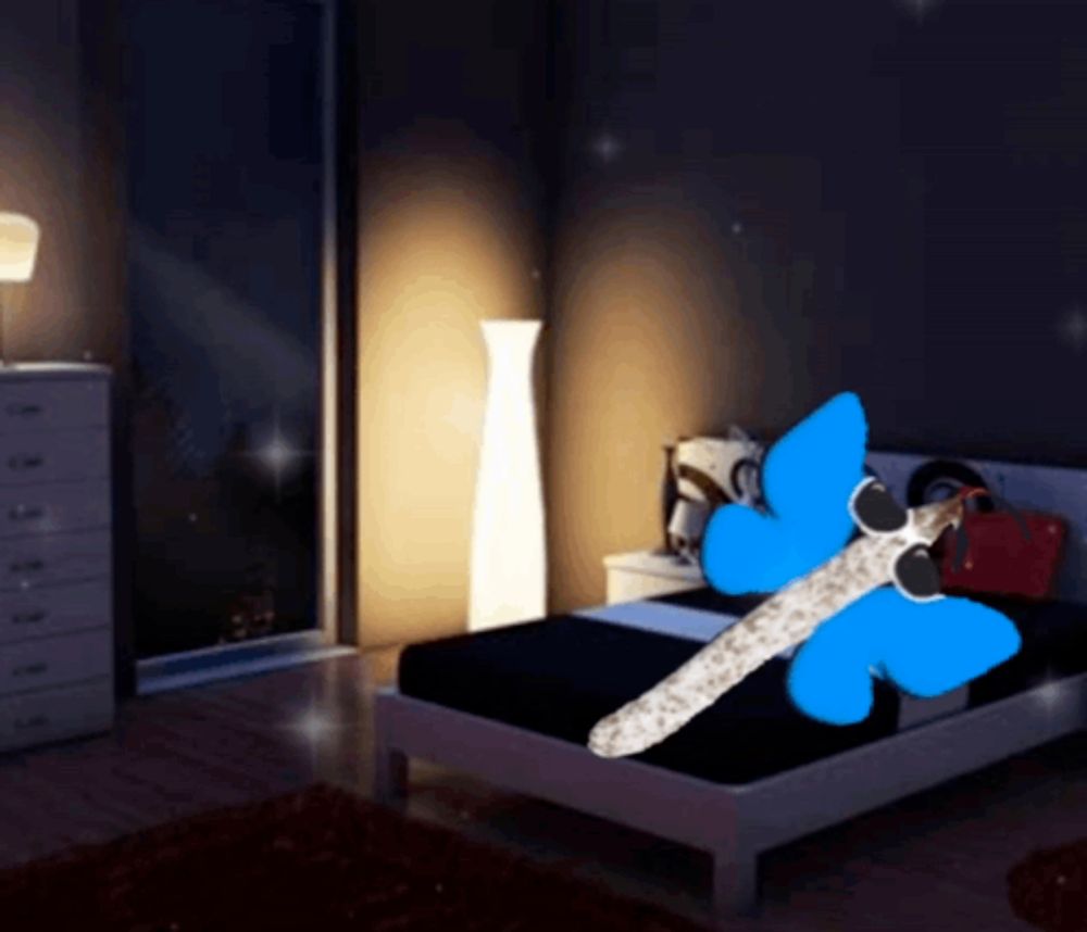 a bedroom with a bed and a blue dragonfly on it