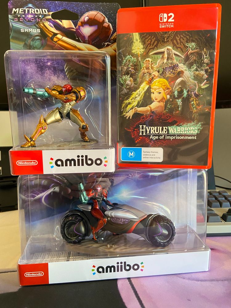 Hyrule Warriors: Age of Imprisonment for Switch 2 alongside Metroid Prime 4 amiibo figures of Samus and Samus on her new bike (Metroid itself doesn’t drop for another month, I don’t know why the amiibo released so much sooner)