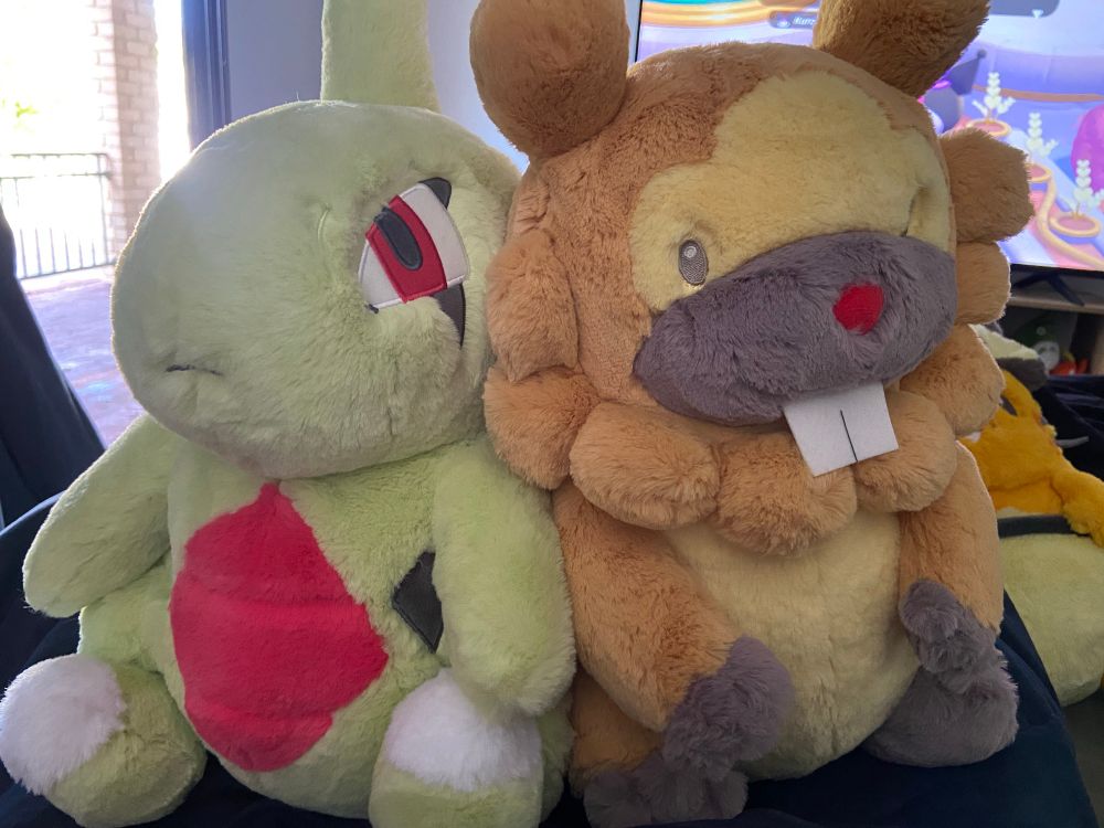 Larvitar and Bidoof plushies from the Pokemon Fuwa Fuwa Daki / Comfy Friends line