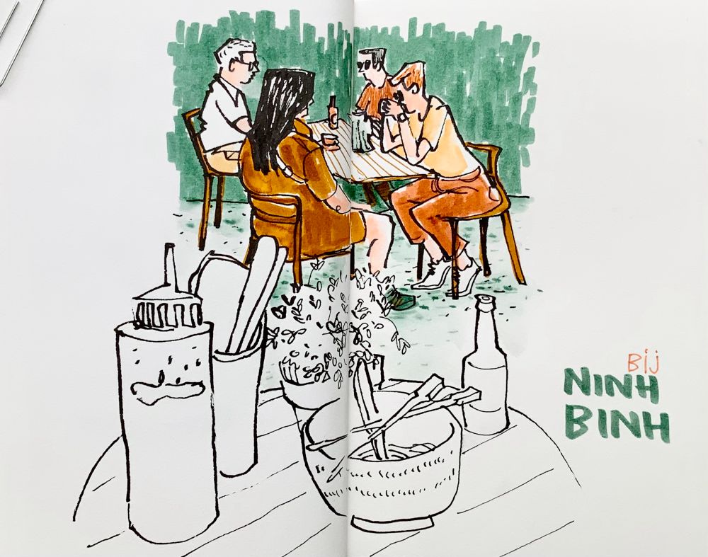 Drawing of table with bowl, bottle of sauce, and table plant. In the background 4 people at a table, only that part colored - with blue/green, ocher yellow and salmon. 