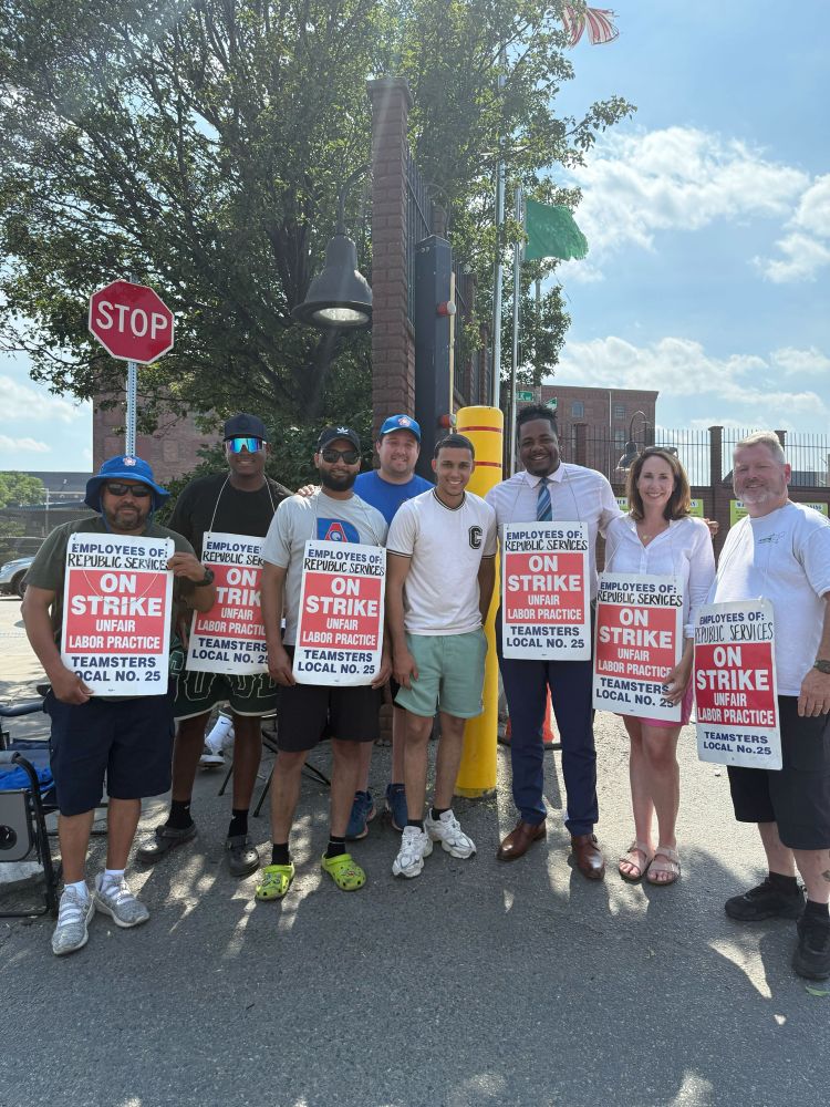 Councilor Santana stands with a group of Teamsters Local 25 members who are on strike outside of Republic services
