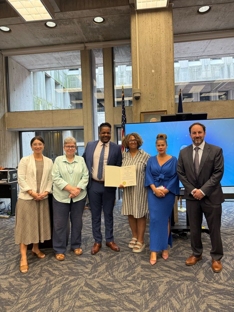 Councilor Santana with Councilors Coletta Zapata, Breadon, Mejia and Weber with a Boston Public Schools staff member, Deana Clark and their resolution