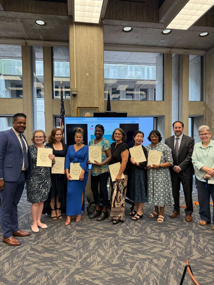 Councilor Santana with Councilors Breadon, Mejia and Weber with Boston Public Schools staff members and their resolutions