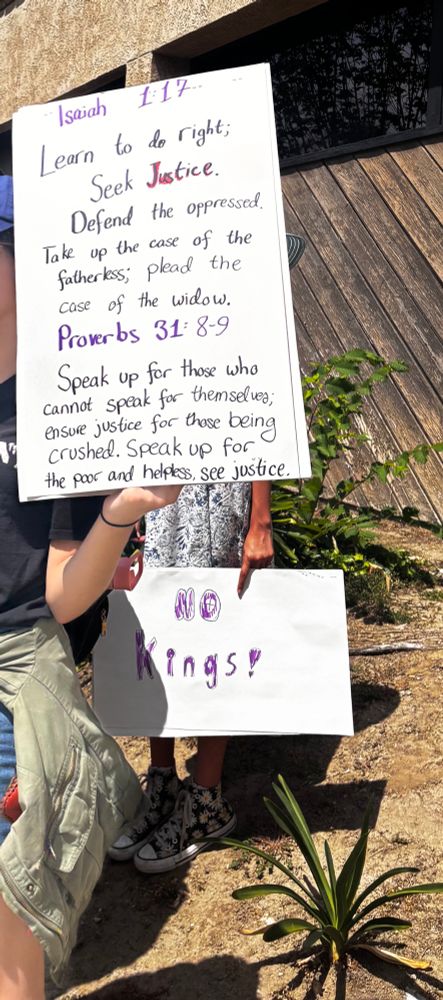 Sign with quote from Isaiah 1:17 and Proverbs 31:9. Using the Bible to serve others not attack them…what a great idea!