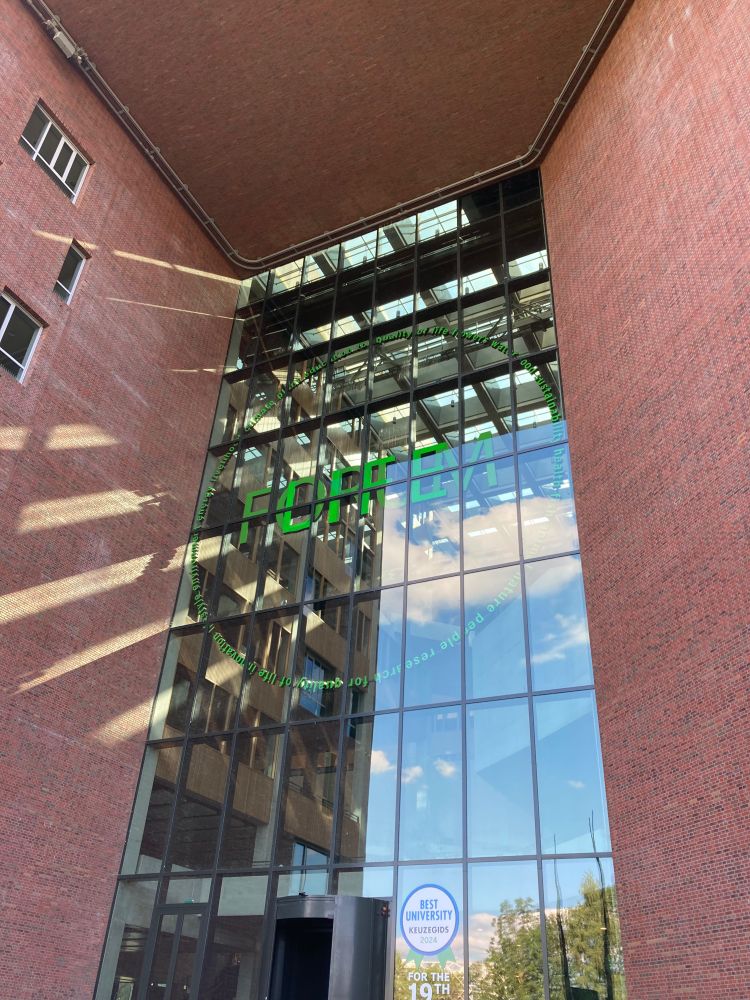 Close-up photo of the iconic red-brown Forum building at Wageningen University. 