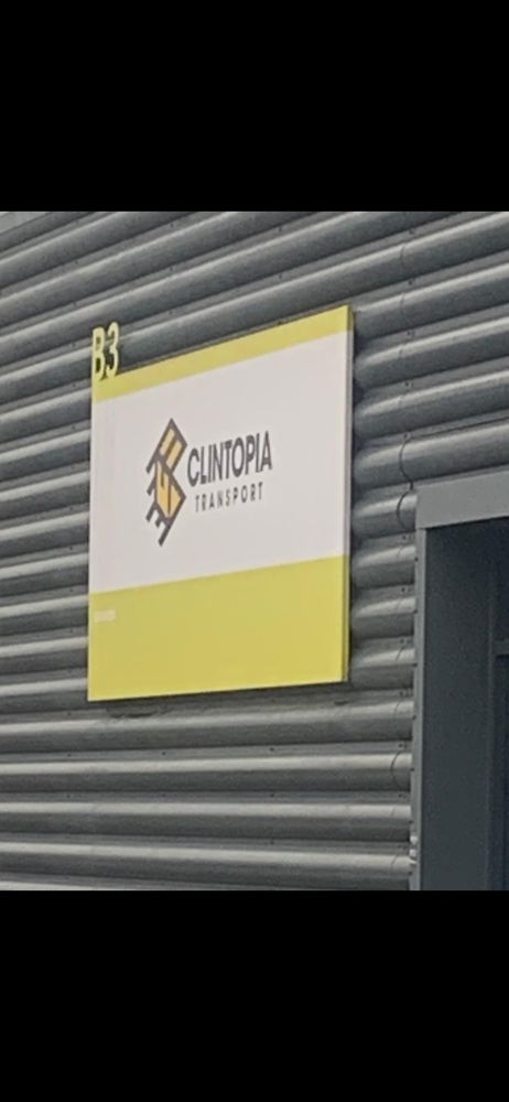 Company sign on industrial unit with the text "CLINTOPIA Transport"