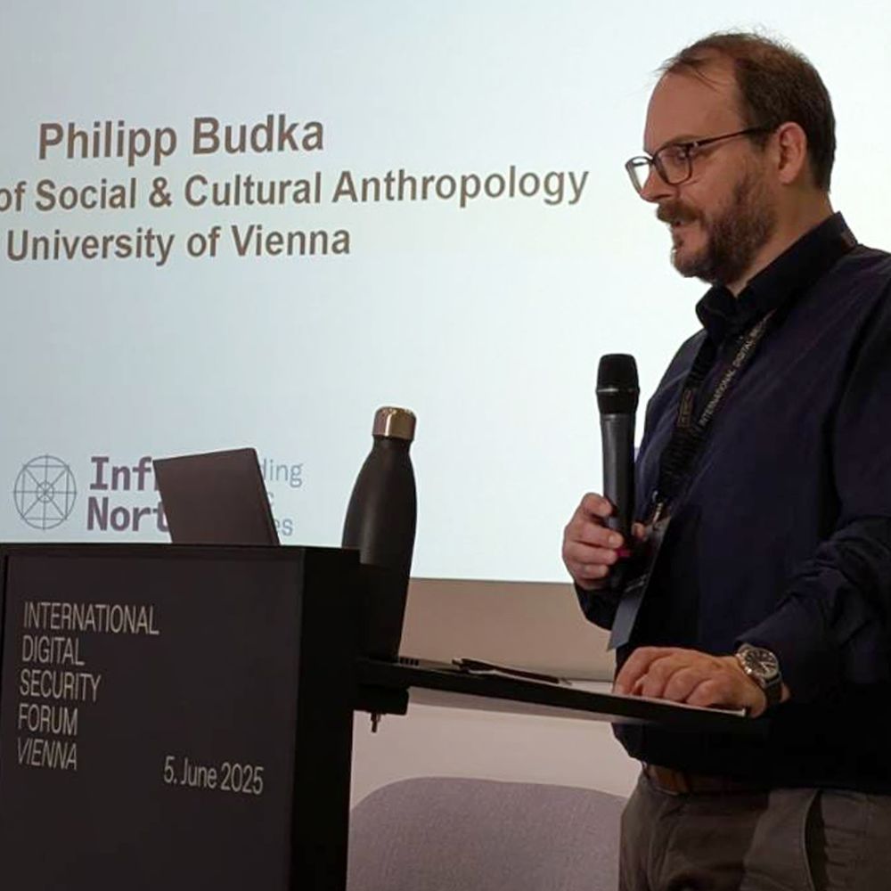 Philipp Budka delivers the keynote address for the Social Sciences Track at the International Digital Security Forum (IDSF) 2025. His talk was titled “Community-Led Digital Sovereignty: Insights and Lessons from an Indigenous Initiative in Remote Canada.”