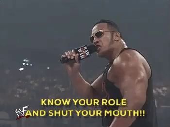 a wrestler says " know your role and shut your mouth " while pointing