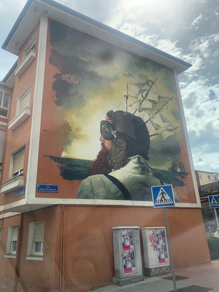 Mural of a sailor on side of building in Santander, Spain.