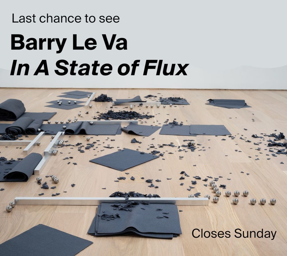 A floor based artwork made from felt squares and ball bearings and metal rods by Barry Le Va, on this image it says - last chance to see Barry Le Va, In A State of Flux
