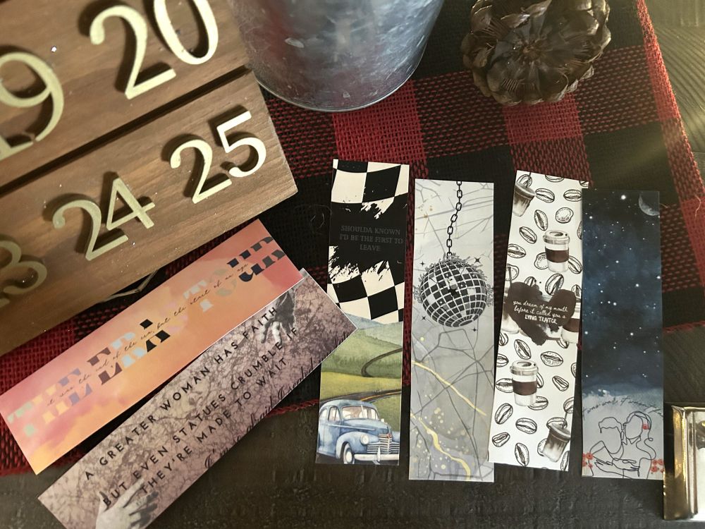 Picture of bookmarks listed in post.  One for the Eras Tour, The Prophecy, Mirrorball, Getaway Car, Is It Over Now, and The Great War.