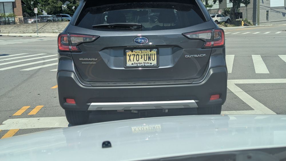 A license plate on a Subaru that reads 