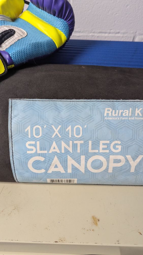 An outdoor canopy bag that says 