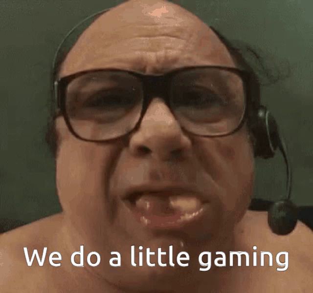 a man wearing glasses and a headset says " we do a little gaming "