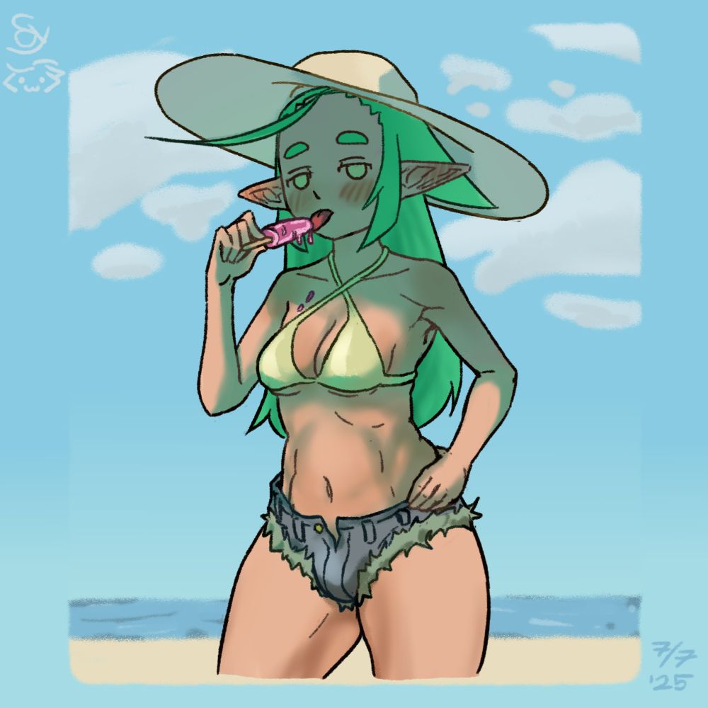 Me suggestively licking an ice stick on the beach wearing beach hat, bikini top and denim booty shorts