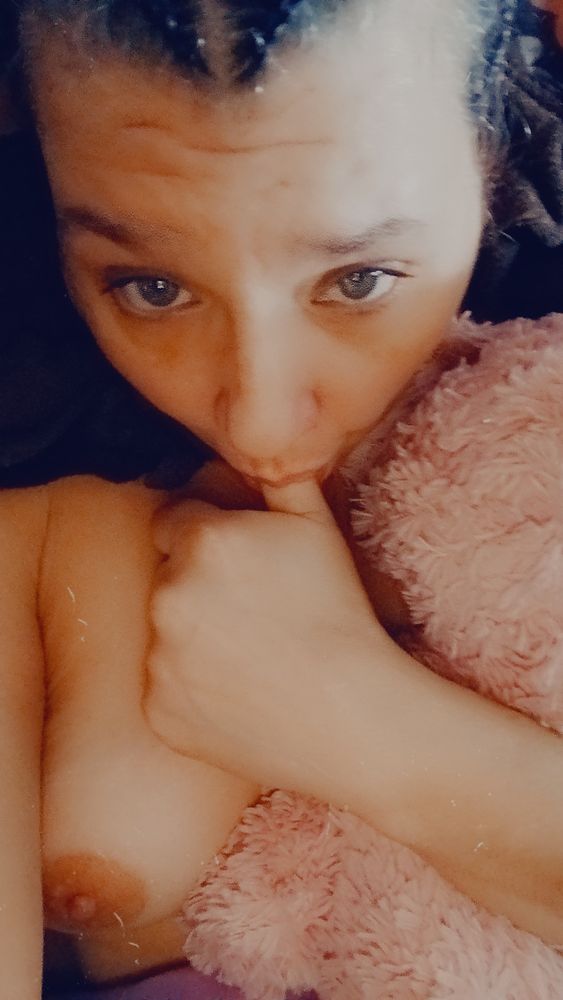 Me sucking my thumb with my pink bunny strawberry 