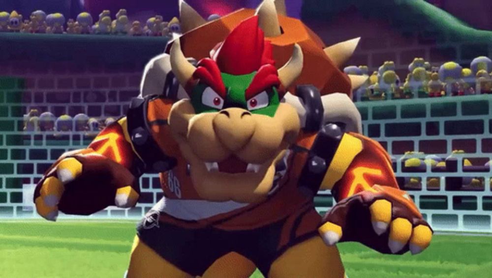 a video game character named bowser is wearing a jersey with the number 96 on it