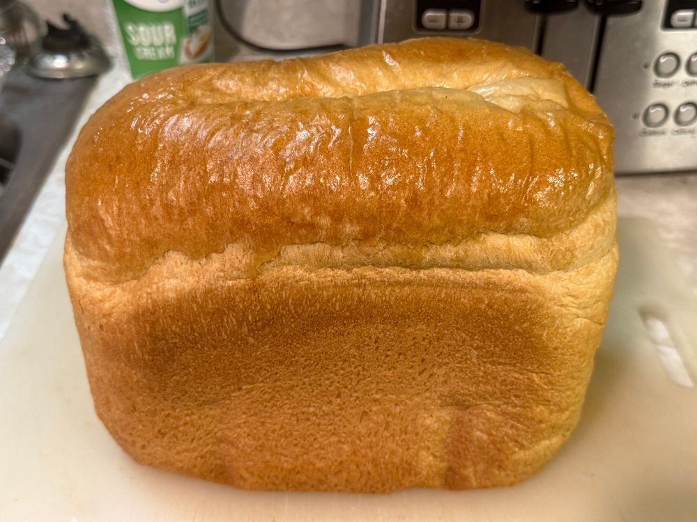Once it cooled enough I popped it out of the pan.  It looks just about perfect!  Of course I had to slice off one end to taste it, and it was delicious!  😋
