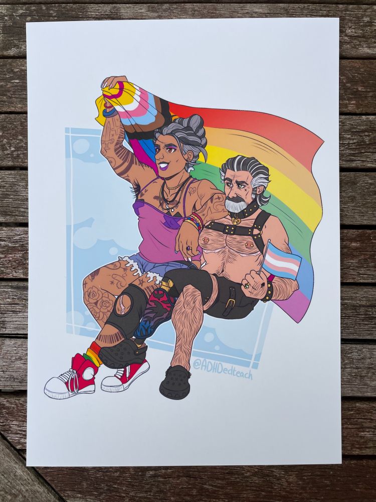 print out of artwork featuring izzy and ed from our flag means death, ed is shown explicitly as transfem, izzy as transmasc, and it's pride themed