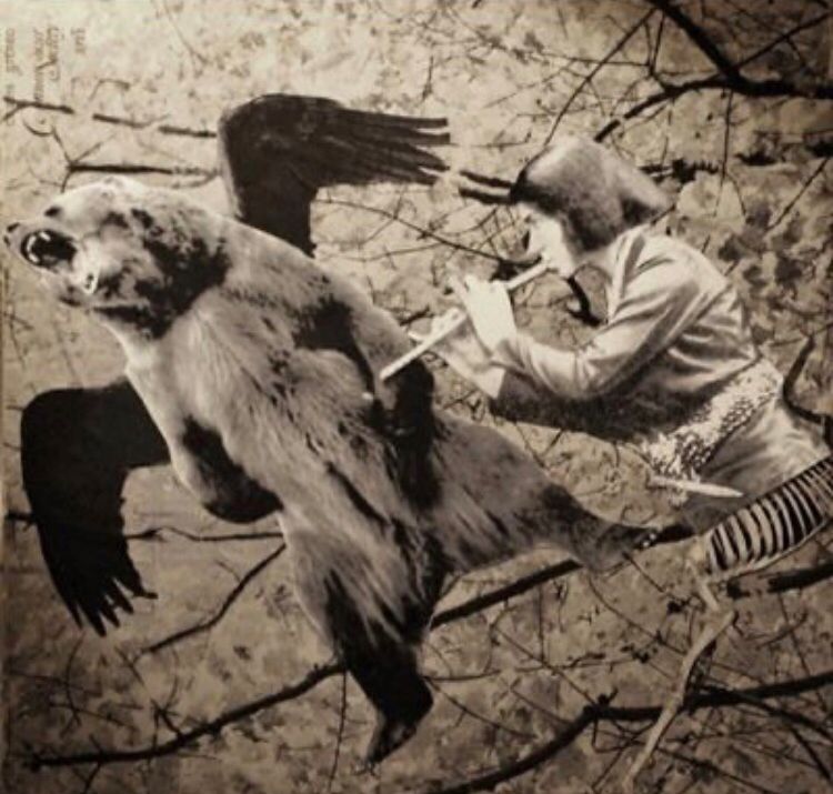 a sepia-tone surreal paper collage i made of a man with a prince valiant haircut and an animal's skeletal legs, playing a penny whistle to a roaring flying bear with wings, set against a forest background.
nina theda black.