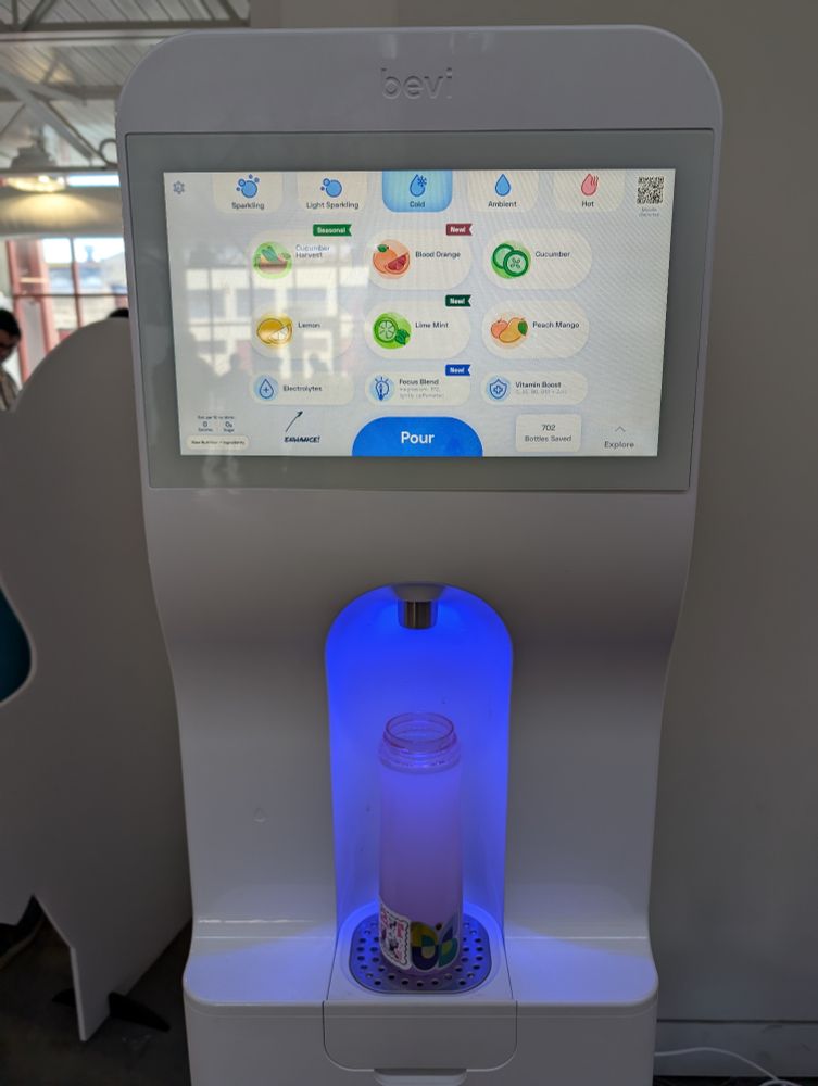 A display of the beverage menu with a bunch of flavored waters, electrolyte add-ins, and sparkling water.