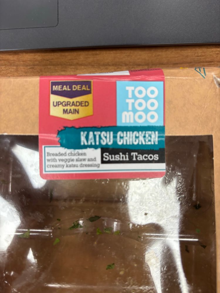 A photo of a Sainsbury’s katsu chicken sushi tacos box  - a great name for a Japanese/ Mexican musical combo 