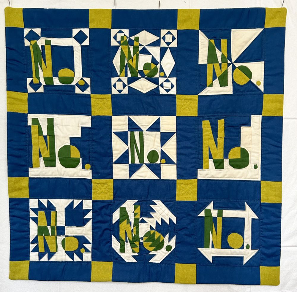 9 block quilt featuring traditional quilt blocks like broken wheel, storm at sea, pinwheel, courthouse steps, sawtooth star, log cabin, bear paw, pineapple and churn dash