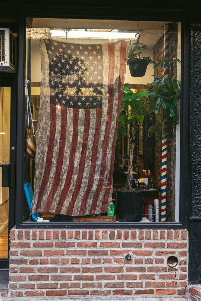 American flag with boxing gloves in NYC window