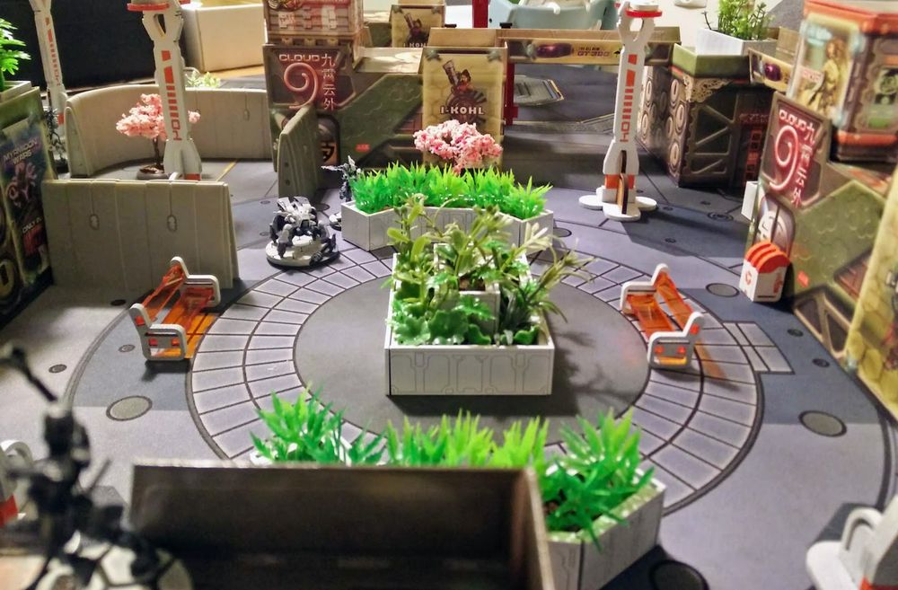 Same table, different angle. A main square of sorts, with planters, benches and trash gans. Oh, and unpainted (gasp!) resin walls. Need to rectify that.