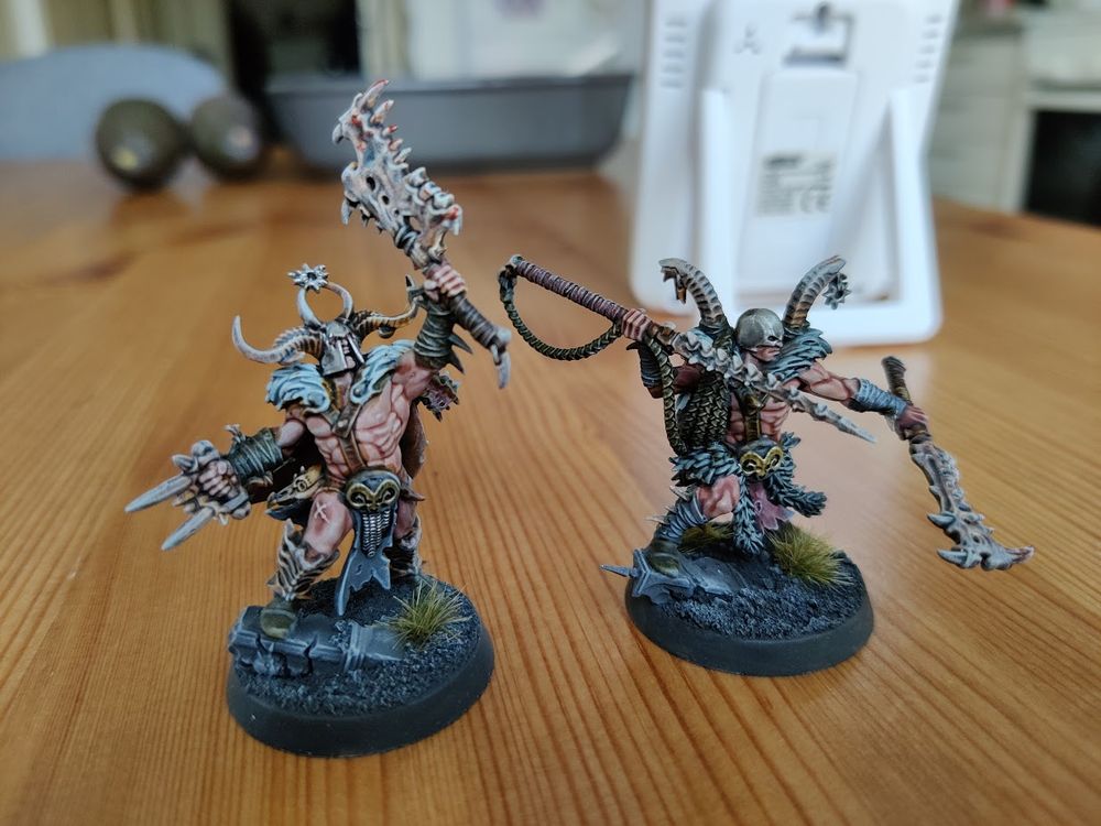 Realized I don't have any really good photos of my Warcry warbands! Here are at least the leader and his right-hand man of the Untamed Beats. Think Conan the barbarian, but with bone weapons. I guess we're in Dark Sun territory here?

Mostly naked flesh and rippling muscles.