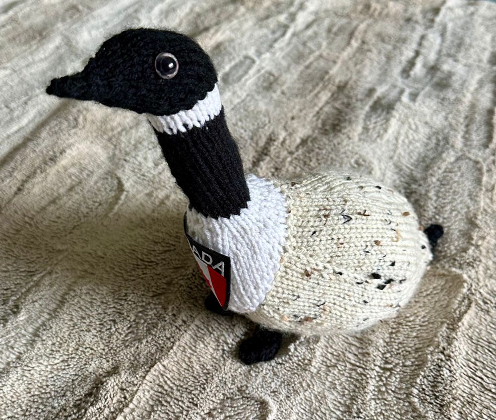 Knit Canada Goose with Canadian flag patch on its chest. 

Becky’s Goose on Ravelry