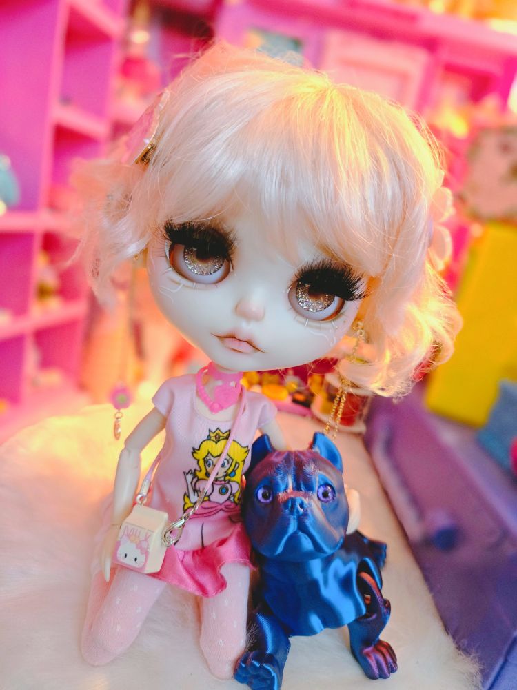 The doll and her dog