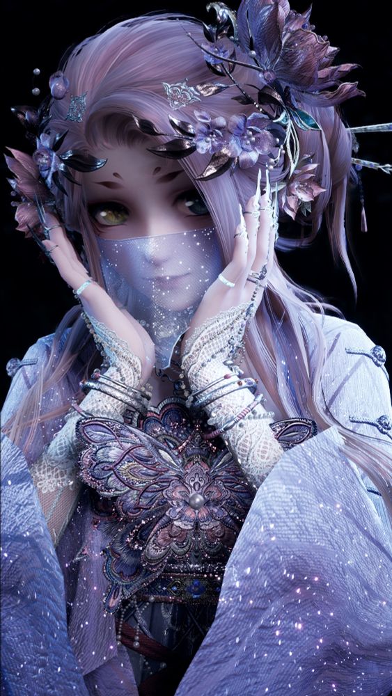 Nikki in an elaborate pink and purple outfit, with sparkly details and very long nails. On her chest is a large embroidered butterfly, and she has many flowers in her hair which is tied into loose and messy buns held up by hair sticks. She holds her hands up to her cheeks, shyly looking to the side.