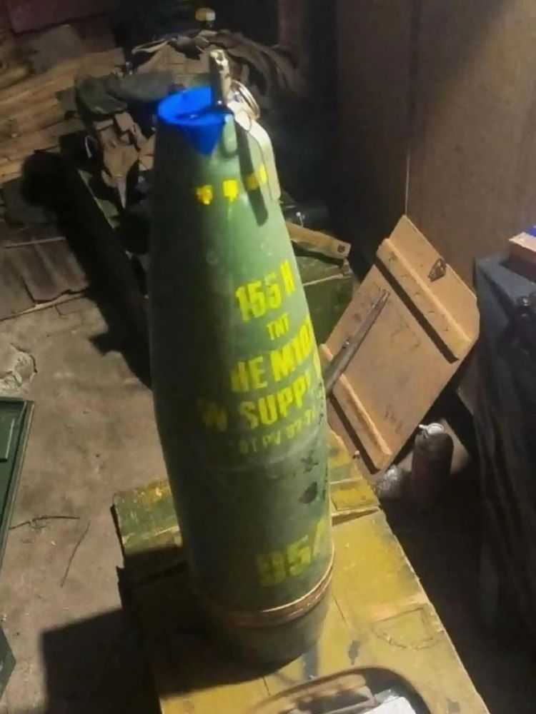 155mm artillery round with a hand grenade primer rigged to the nose. 