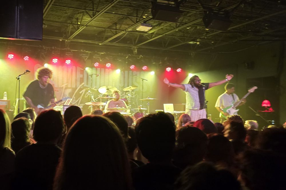 I'm not supposed to explain it, but it's the band Soul Glo performing live