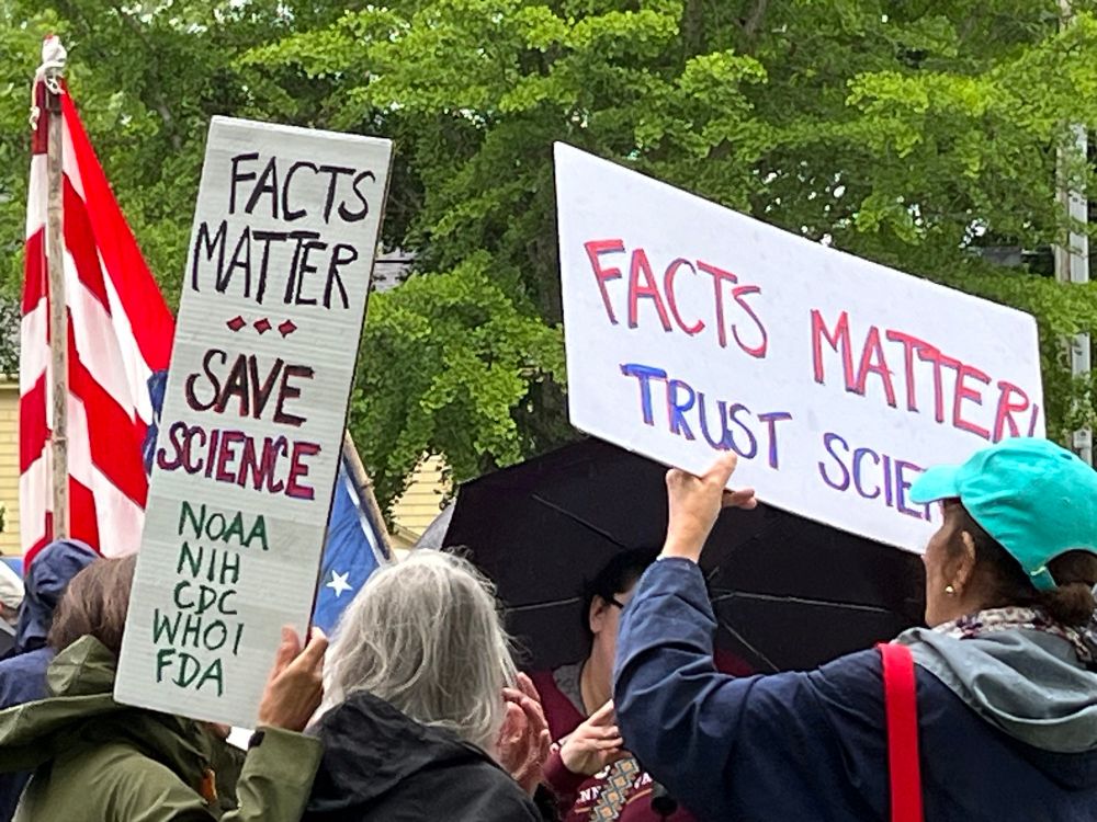 Sign stating facts matter, save science, noaa, nih, cdc, who, fda. Sign stating facts matter, trust science